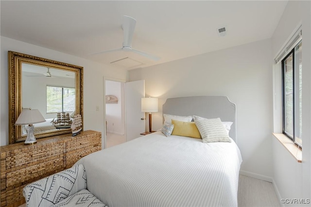 941 Wilton Coves Dr, Hartfield, VA 23071 - carpeted bedroom with baseboards and ceiling fan