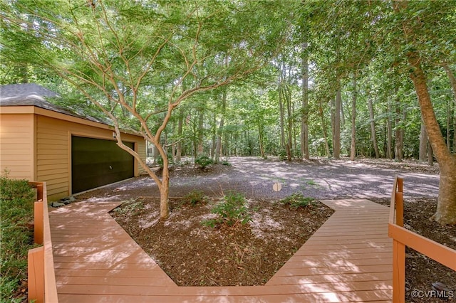941 Wilton Coves Dr, Hartfield, VA 23071 - view of yard with a garage and an outbuilding