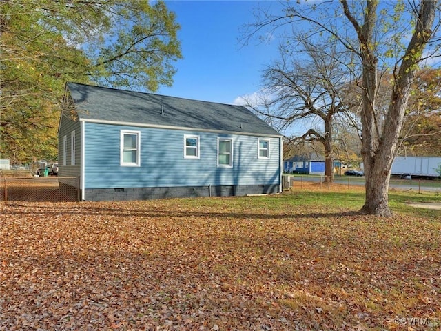 exterior space with fence and crawl space