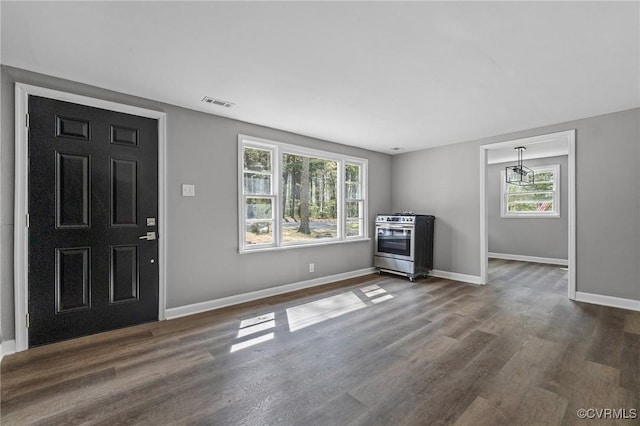 14008 Tyus Rd, Sussex, VA 23882 - entrance foyer featuring visible vents, baseboards, and dark wood-style flooring