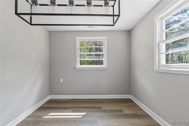14008 Tyus Rd, Sussex, VA 23882 - interior space with dark wood finished floors and baseboards