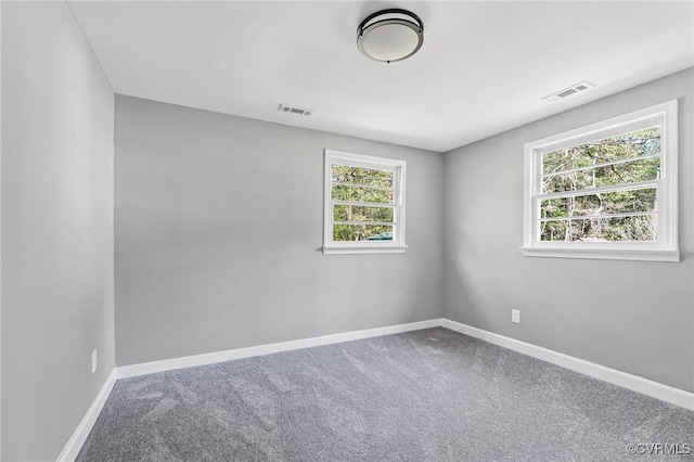 14008 Tyus Rd, Sussex, VA 23882 - unfurnished room featuring carpet, visible vents, and baseboards