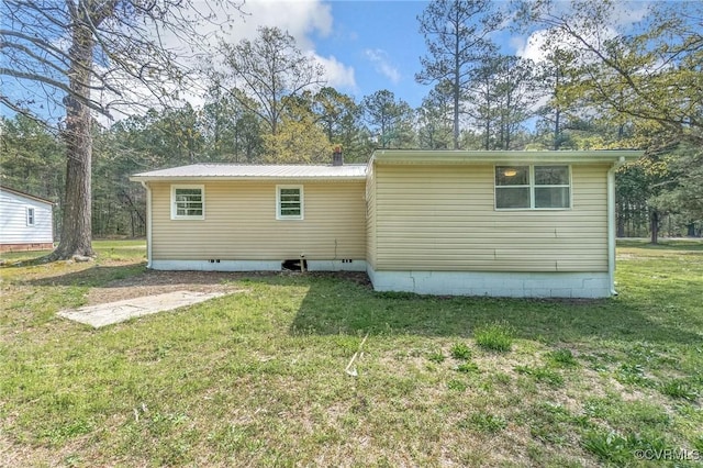 14008 Tyus Rd, Sussex, VA 23882 - rear view of property with a yard, crawl space, and metal roof