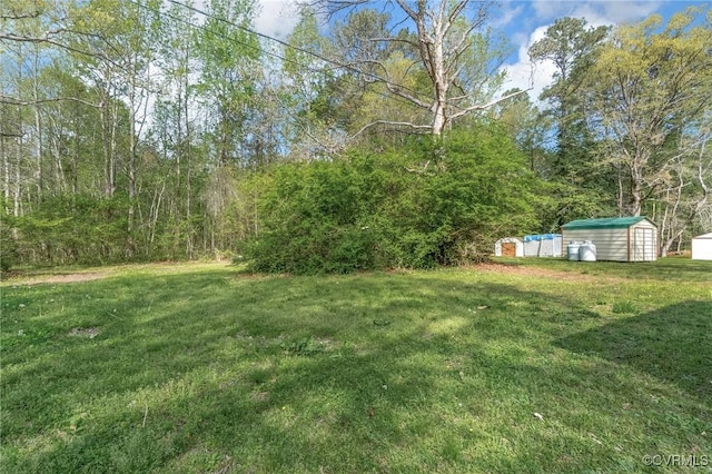 14008 Tyus Rd, Sussex, VA 23882 - view of yard with an outbuilding and a shed