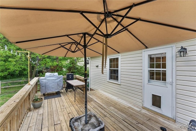wooden deck with area for grilling