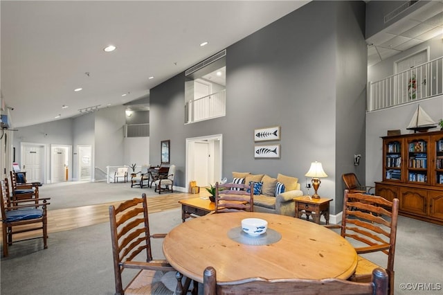 301 Beacon Ridge Dr Unit 109, Hopewell, VA 23860 - carpeted dining room with high vaulted ceiling and recessed lighting