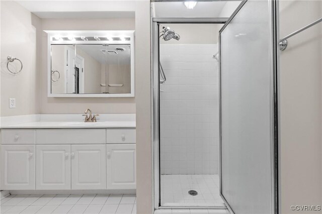 301 Beacon Ridge Dr Unit 109, Hopewell, VA 23860 - bathroom featuring a stall shower, vanity, and tile patterned flooring
