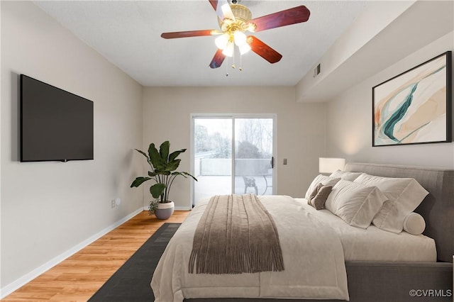 301 Beacon Ridge Dr Unit 109, Hopewell, VA 23860 - bedroom with access to exterior, wood finished floors, and ceiling fan