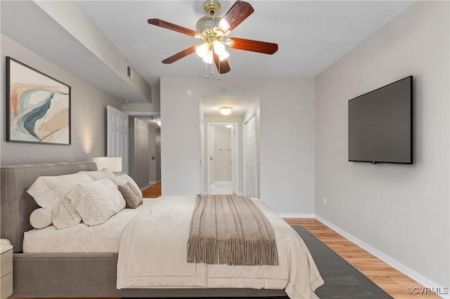 301 Beacon Ridge Dr Unit 109, Hopewell, VA 23860 - bedroom with wood finished floors, ensuite bath, and ceiling fan