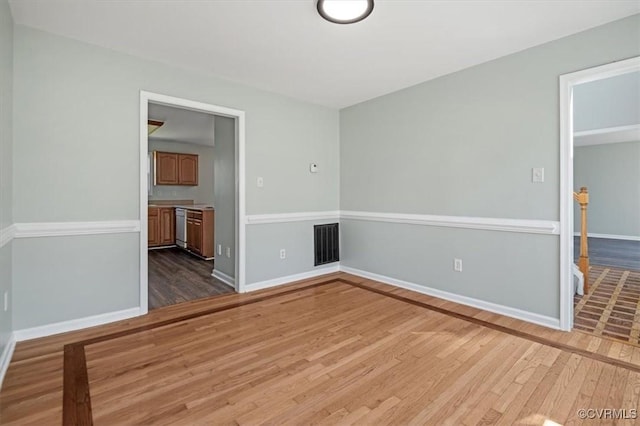 2567 Exhall Ct, Chester, VA 23831 - spare room with dark wood finished floors and baseboards