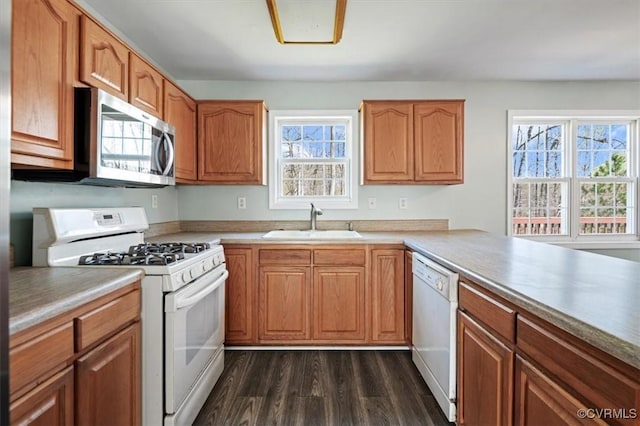 2567 Exhall Ct, Chester, VA 23831 - kitchen featuring white appliances, a sink, plenty of natural light, and dark wood-style floors