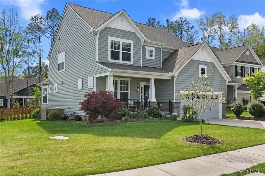 6501 White Rock Ter, Moseley, VA 23120 - view of front facade featuring covered porch, concrete driveway, a garage, and a shingled roof