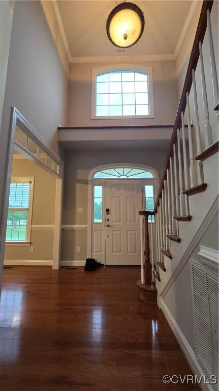 454 W Spring Forest Rd, King William, VA 23086 - foyer with crown molding, baseboards, and wood finished floors