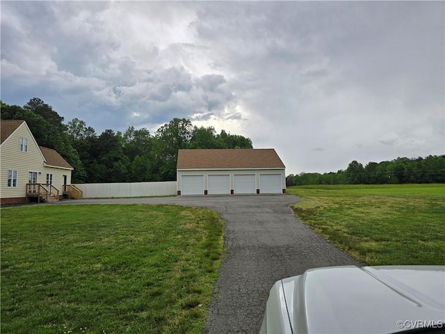 454 W Spring Forest Rd, King William, VA 23086 - exterior space with a yard, an outdoor structure, fence, and a detached garage