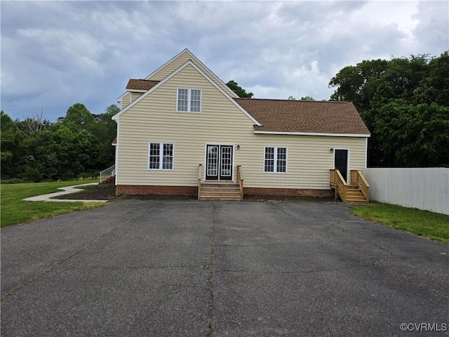 454 W Spring Forest Rd, King William, VA 23086 - rear view of house featuring roof with shingles and fence