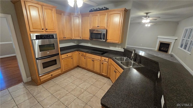 454 W Spring Forest Rd, King William, VA 23086 - kitchen featuring a sink, open floor plan, a ceiling fan, light tile patterned floors, and appliances with stainless steel finishes