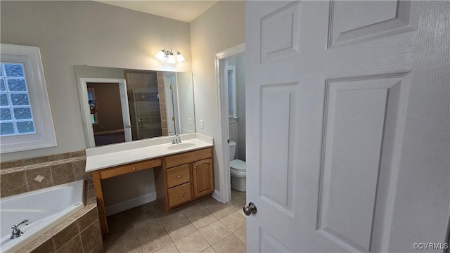 454 W Spring Forest Rd, King William, VA 23086 - bathroom featuring toilet, a tile shower, tile patterned floors, a bath, and vanity