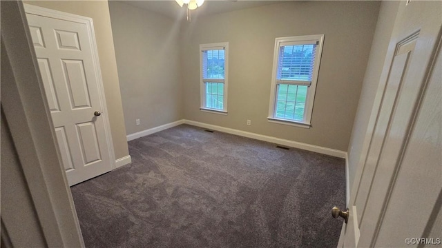 454 W Spring Forest Rd, King William, VA 23086 - unfurnished room featuring a ceiling fan, dark carpet, baseboards, and visible vents