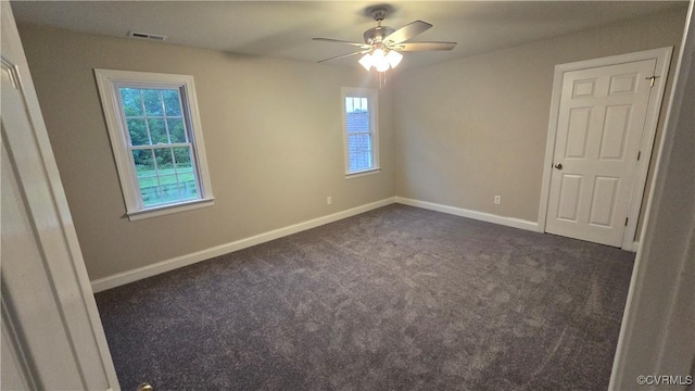 454 W Spring Forest Rd, King William, VA 23086 - spare room featuring ceiling fan, dark colored carpet, baseboards, and visible vents