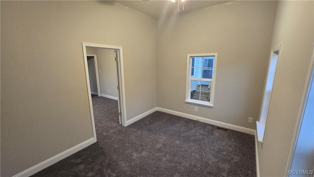 454 W Spring Forest Rd, King William, VA 23086 - unfurnished room featuring baseboards, dark carpet, visible vents, and high vaulted ceiling