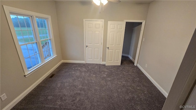 454 W Spring Forest Rd, King William, VA 23086 - spare room featuring ceiling fan, baseboards, and dark carpet