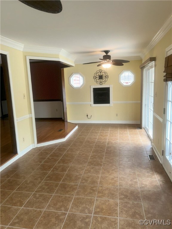 2611 Mistwood Forest Dr, Chester, VA 23831 - unfurnished living room featuring tile patterned floors, baseboards, a ceiling fan, and ornamental molding