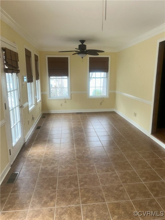 2611 Mistwood Forest Dr, Chester, VA 23831 - empty room featuring baseboards, tile patterned floors, crown molding, visible vents, and ceiling fan