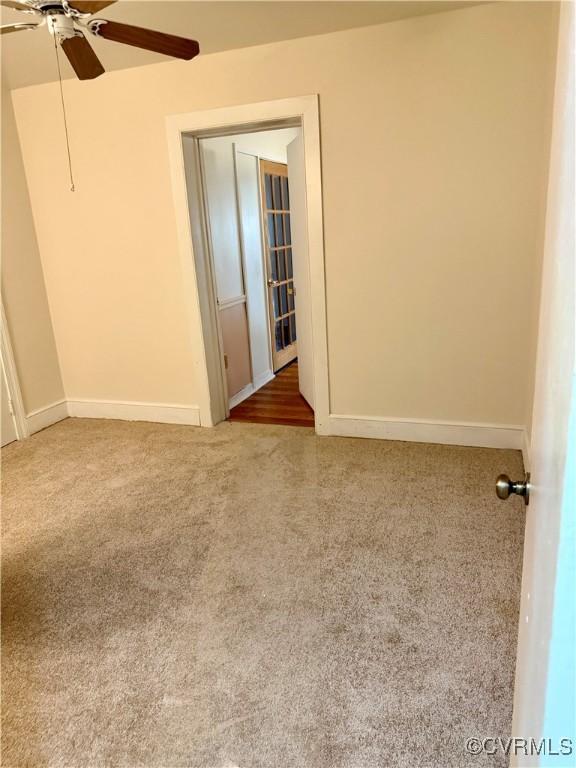 2919 Park Dr, Petersburg, VA 23805 - carpeted empty room with ceiling fan and baseboards