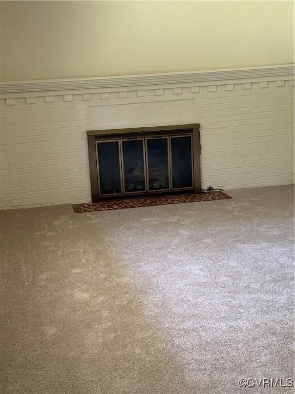2919 Park Dr, Petersburg, VA 23805 - detailed view of carpet flooring, a fireplace, and brick wall