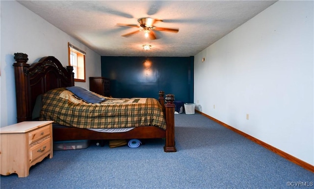 carpeted bedroom featuring baseboards, ceiling fan, and a textured ceiling