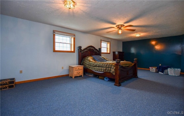 bedroom featuring baseboards, carpet flooring, a textured ceiling, and ceiling fan
