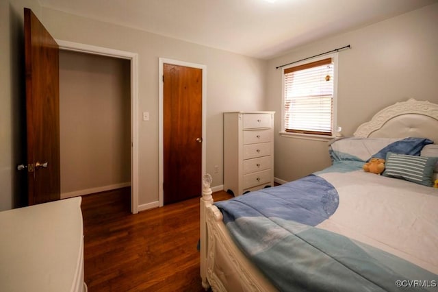 8186 Signal Hill Rd, Richmond, VA 23111 - bedroom featuring dark wood-style flooring and baseboards