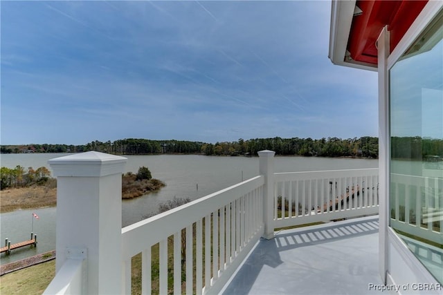 balcony featuring a water view