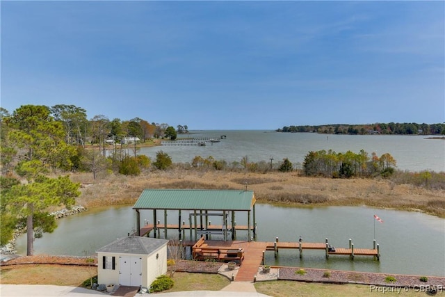 dock area featuring a water view and boat lift