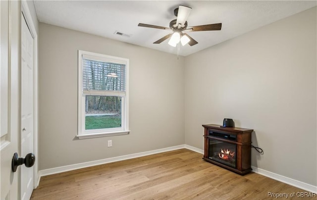 104 Martin Ln, Bohannon, VA 23021 - empty room with light wood-type flooring, baseboards, a ceiling fan, and visible vents