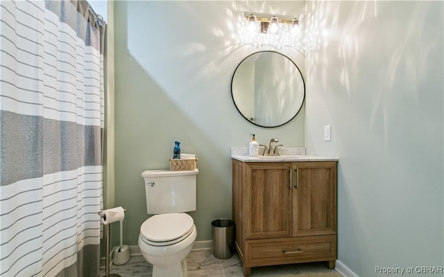 104 Martin Ln, Bohannon, VA 23021 - full bath with vanity, toilet, curtained shower, marble finish floor, and baseboards