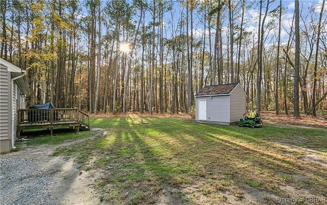 104 Martin Ln, Bohannon, VA 23021 - view of yard with a storage shed, an outbuilding, and a deck