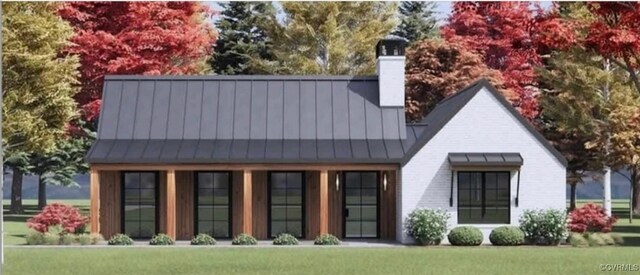 15357 Washington Hwy, Doswell, VA 23047 - back of house with a standing seam roof, a chimney, and a yard
