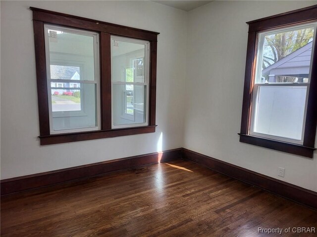 325 Hampton Roads Ave, Hampton, VA 23661 - unfurnished room featuring baseboards and dark wood-style floors