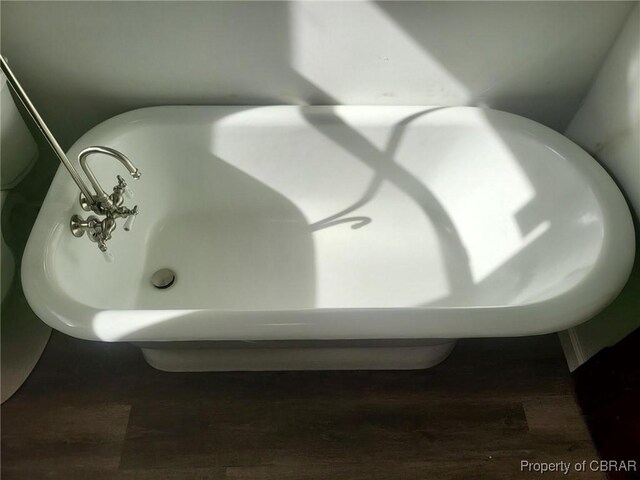 325 Hampton Roads Ave, Hampton, VA 23661 - details with wood finished floors and a tub to relax in