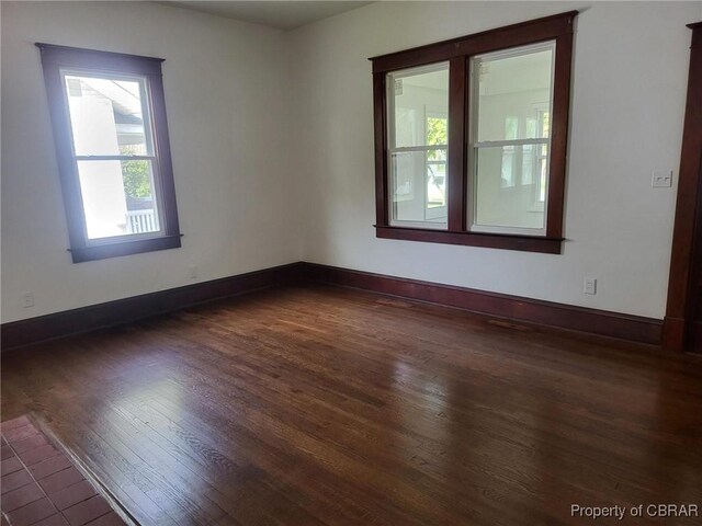 325 Hampton Roads Ave, Hampton, VA 23661 - unfurnished room with dark wood-style flooring and baseboards