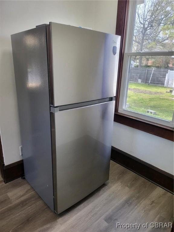 325 Hampton Roads Ave, Hampton, VA 23661 - details featuring baseboards, freestanding refrigerator, and wood finished floors
