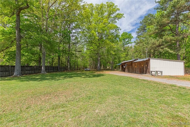 12161 Ashland Heights Rd, Ashland, VA 23005 - view of yard featuring a pole building, an outdoor structure, and fence