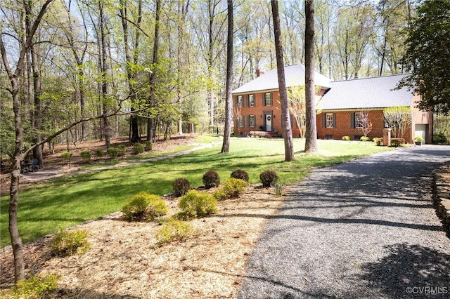 11494 Riveredge Rd, Doswell, VA 23047 - colonial home with a front yard and a chimney