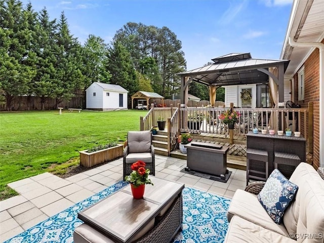 9208 Gayton Rd, Glen Allen, VA 23229 - view of patio / terrace featuring outdoor lounge area, a gazebo, a storage unit, and a wooden deck