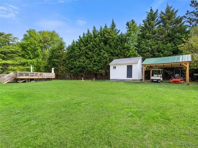 9208 Gayton Rd, Glen Allen, VA 23229 - view of green lawn with a carport, a deck, and an outdoor structure