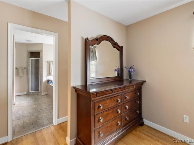 9208 Gayton Rd, Glen Allen, VA 23229 - hall with baseboards and light stone finish floors