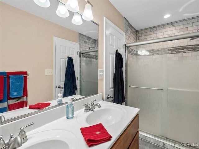 9208 Gayton Rd, Glen Allen, VA 23229 - full bath featuring a stall shower, double vanity, and recessed lighting