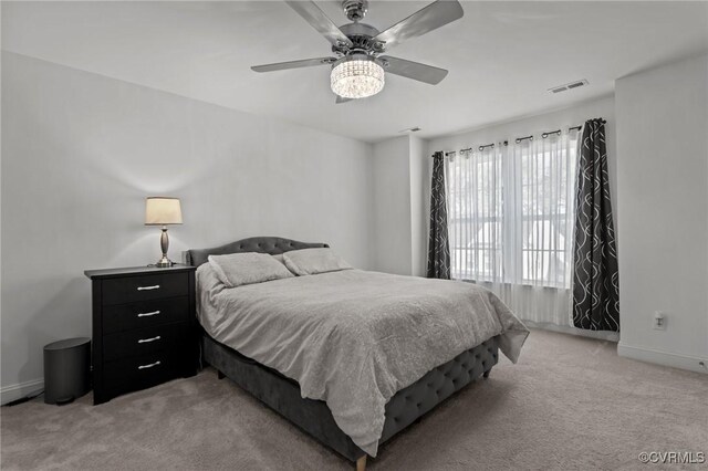 7217 Leire Ln, Chesterfield, VA 23832 - bedroom with light colored carpet, baseboards, and ceiling fan