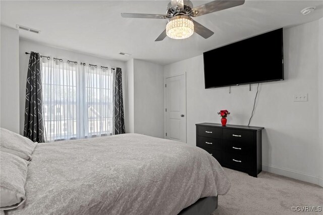 7217 Leire Ln, Chesterfield, VA 23832 - bedroom featuring light colored carpet, baseboards, and ceiling fan